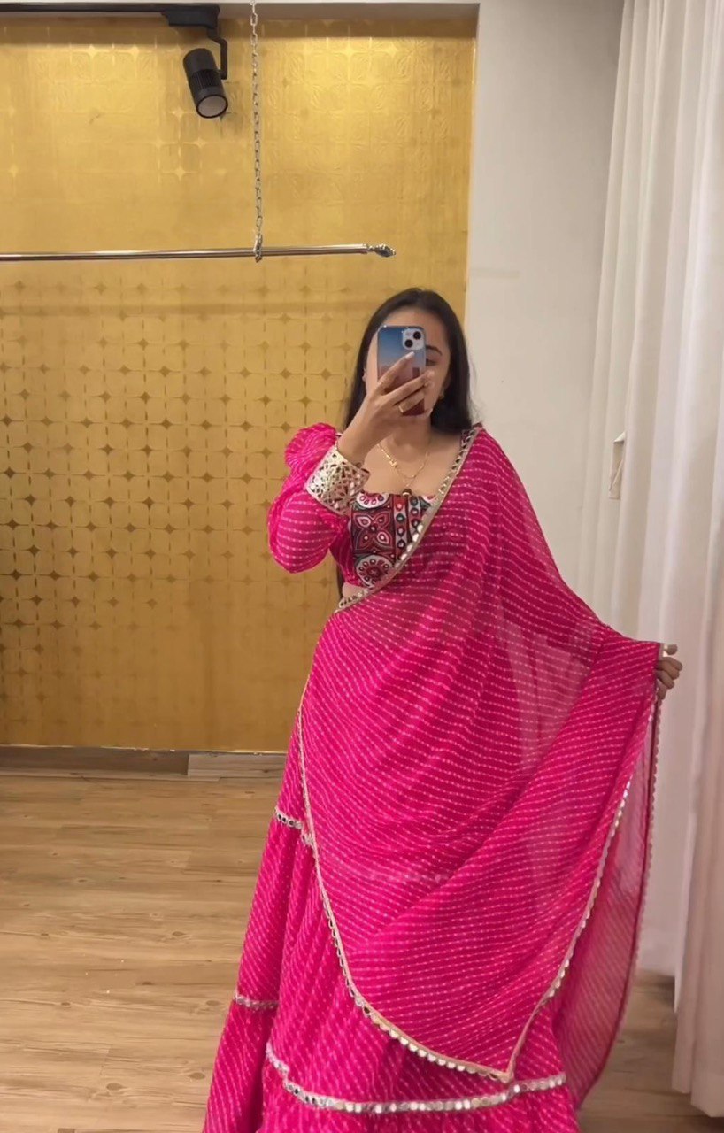 Rani Color Georgette With Printed And Mirror Lace Work Navratri Lehenga Choli