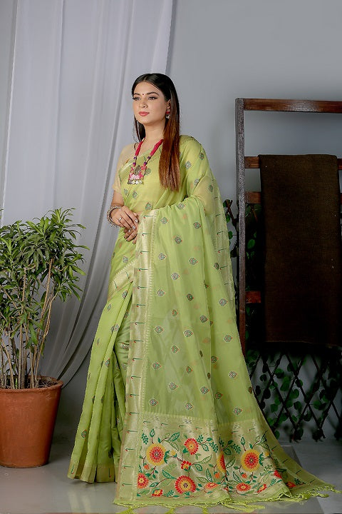Green Paithani Saree In Organza Smooth Fabric With Rich Weaving And Cotton Tassles On Pallu