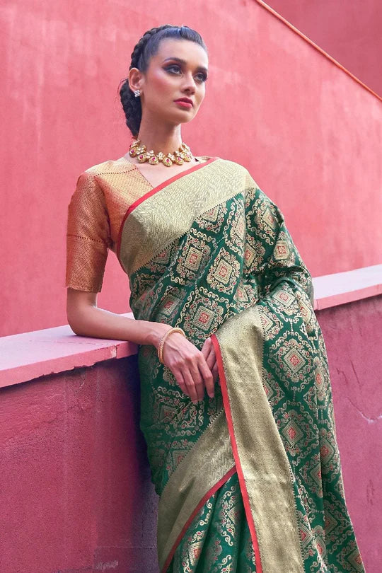 Green Colored Festive Wear Patola Woven Silk Saree