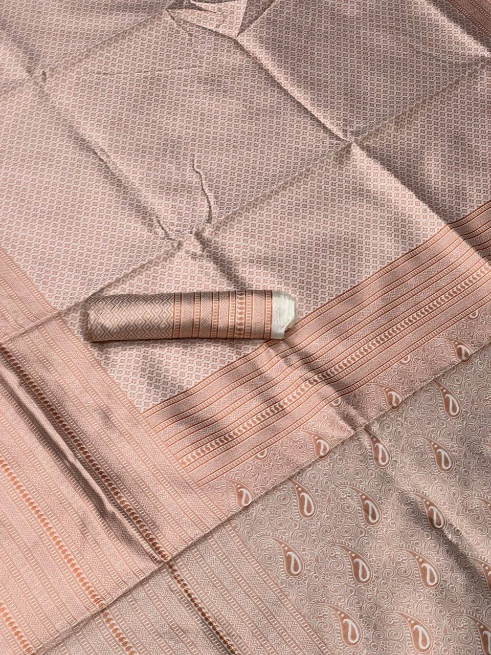 Stunning Off White Colour Saree Weaved With Copper Zari Comes With Heavy Brocade Blouse